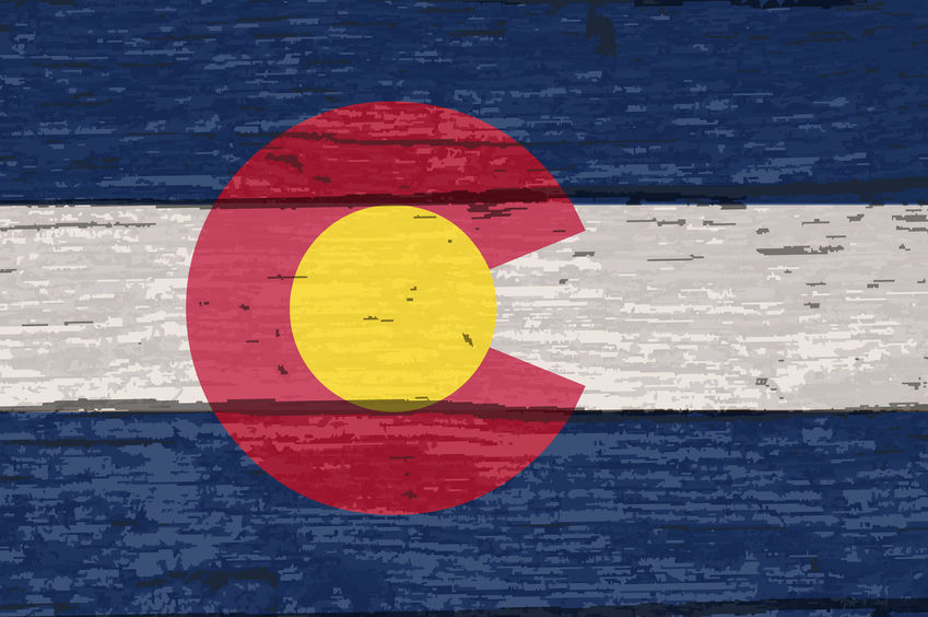 Colorado State Flag On Old Timber